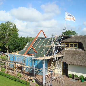 Nieuwe kapconstructie over bestaande boerderij